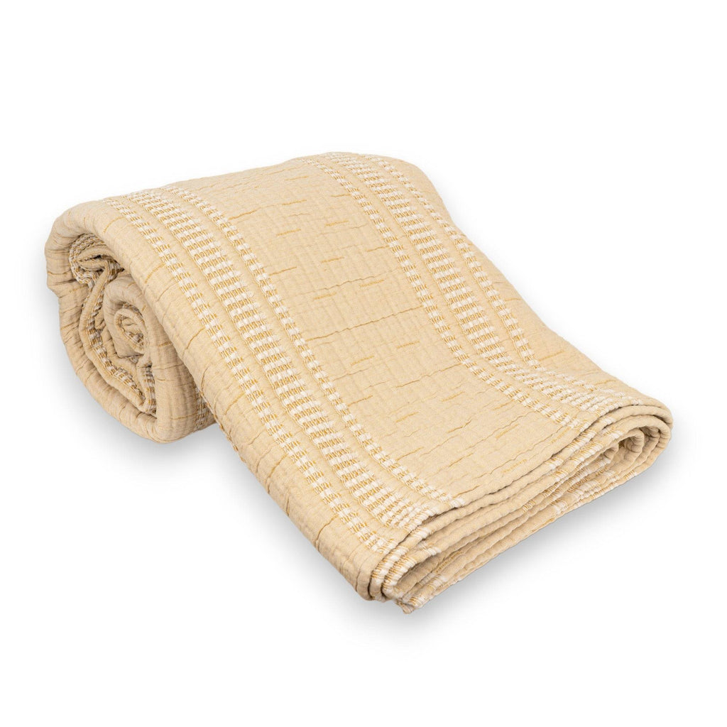 Folded TerraCotton Blanket in beige color